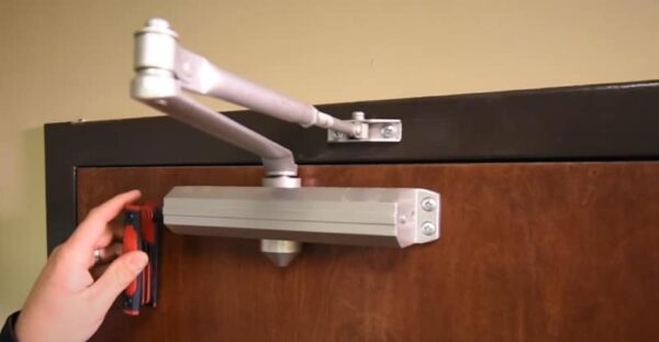 Door closer hardware that is not functioning properly.